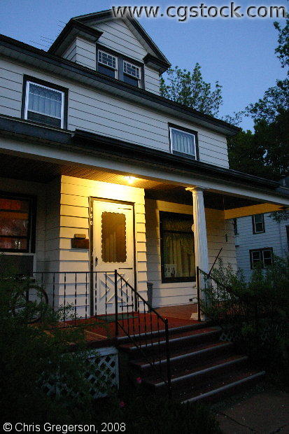 House with Porch Light, Dusk