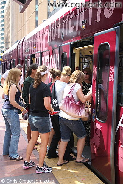 Passengers Boarding Hiawatha Light Rail Train