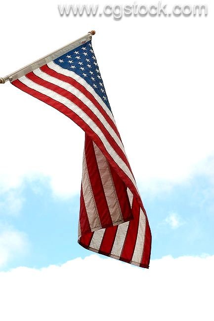 American Flag and a Blue Sky with Clouds