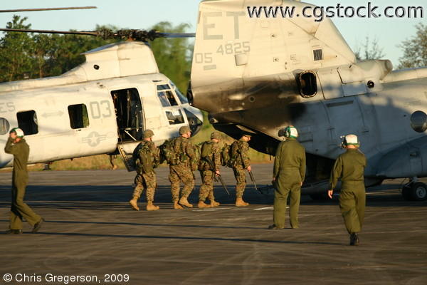 Marines Boarding a CH-53 Sea Stallion, Clark Air Base, Philippines