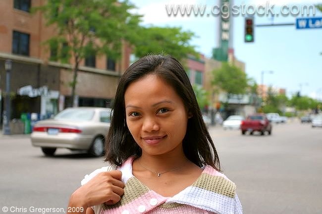 Young Woman at Uptown Intersection